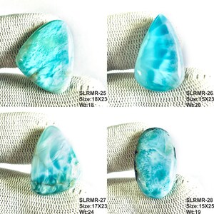 May include: Four polished Larimar gemstones in various shapes. Top left: SLRMR-25, 18x23mm, 18g. Top right: SLRMR-26, 15x23mm, 20g. Bottom left: SLRMR-27, 17x23mm, 24g. Bottom right: SLRMR-28, 15x25mm, 19g. Each stone displays unique blue and white patterns.