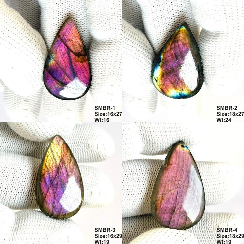 May include: Four teardrop-shaped labradorite gemstones with iridescent purple, pink, and gold hues. Each stone is unique, with visible internal patterns. The sizes are 16x27, 18x27, 16x29, and 18x29. The weights are 16, 24, and 19.