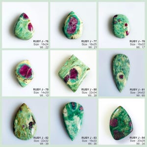 May include: A collection of nine polished ruby in fuchsite gemstones, each labelled with a unique code, dimensions in millimetres, and weight in carats. The stones feature vibrant magenta-pink ruby inclusions set within green fuchsite matrix.