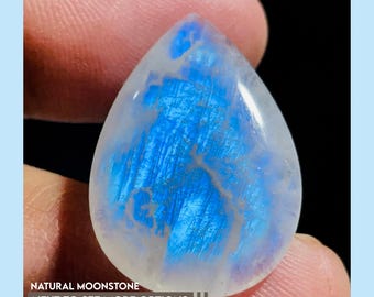 Natural Rainbow Moonstone Cabochons, hand-selected for their stunning blue fire and rainbow flash.