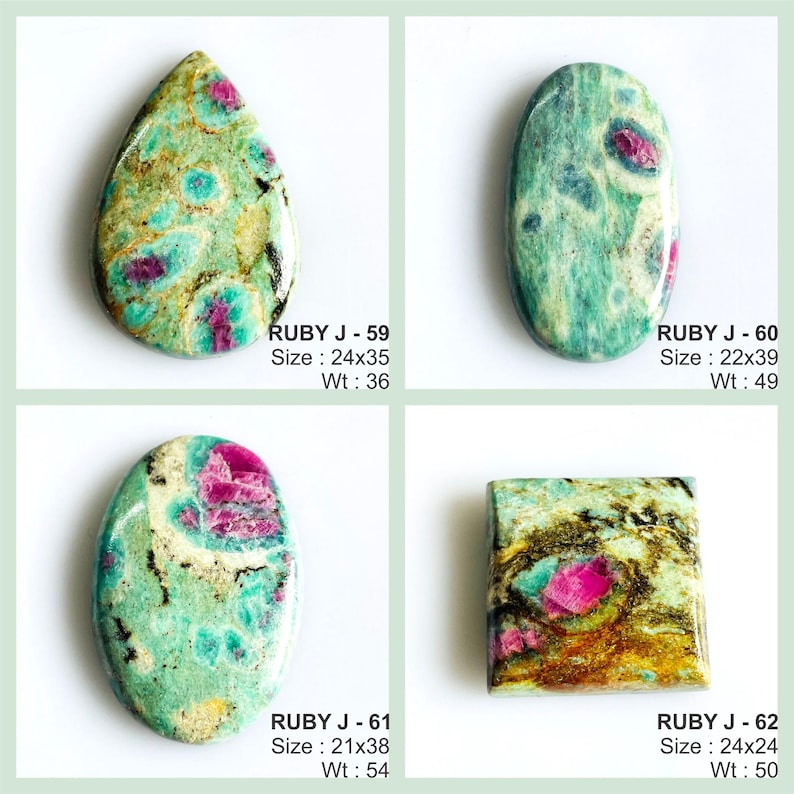 May include: Four polished cabochon gemstones featuring a mix of teal, green, and vibrant magenta ruby inclusions. Each stone is labelled with a code and dimensions in mm, including Ruby J-59 (24x35mm), J-60 (22x39mm), J-61 (21x38mm), and J-62 (24x24mm).