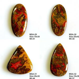 K&ouml;nnte beinhalten: Vier polierte Cabochons mit wirbelnden Mustern in Rot, Braun und Gold. MSA-29: 19x39mm, Wt:41g. MSA-30: 20x42mm, Wt:30g. MSA-31: 26x30mm, Wt:44g. MSA-32: 19x38mm, Wt:37g. Die Steine sind oval und tropfenf&ouml;rmig mit glatten, gl&auml;nzenden Oberfl&auml;chen.
