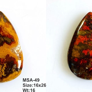 K&ouml;nnte beinhalten: Zwei polierte, birnenf&ouml;rmige Cabochons mit komplexen Mustern in Braun, Orange und Rot. Der linke Stein ist mit MSA-49, Gr&ouml;&szlig;e 16x26, Gewicht 16 beschriftet. Der rechte Stein mit MSA-50, Gr&ouml;&szlig;e 15x23, Gewicht 11. Beide haben glatte, gl&auml;nzende Oberfl&auml;chen.