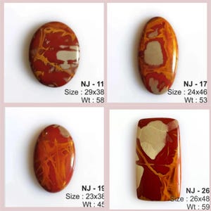May include: Four polished gemstones with unique patterns and colors. The stones vary in shape, including oval and rectangular. Each stone has a different size, with the largest measuring 29x38. The gemstones are red, orange, and cream-colored.