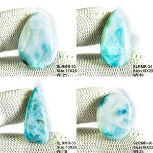 May include: Four polished Larimar gemstones with distinct blue and white marbled patterns. The stones are labeled SLRMR-33 (17x25mm), SLRMR-34 (15x25mm), SLRMR-35 (13x28mm), and SLRMR-36 (18x22mm), each displaying unique cloud-like textures and shapes.