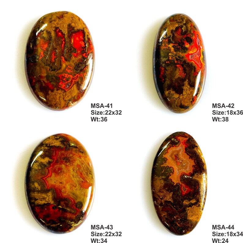 K&ouml;nnte beinhalten: Vier polierte ovale Cabochons mit wirbelnden Mustern in Dunkelbraun, Schwarz und leuchtendem Rot. Jeder Stein ist mit Codes beschriftet: MSA-41 (22x32, 36), MSA-42 (18x36, 38), MSA-43 (22x32, 34) und MSA-44 (18x34, 24) f&uuml;r Gr&ouml;&szlig;e und Gewicht.
