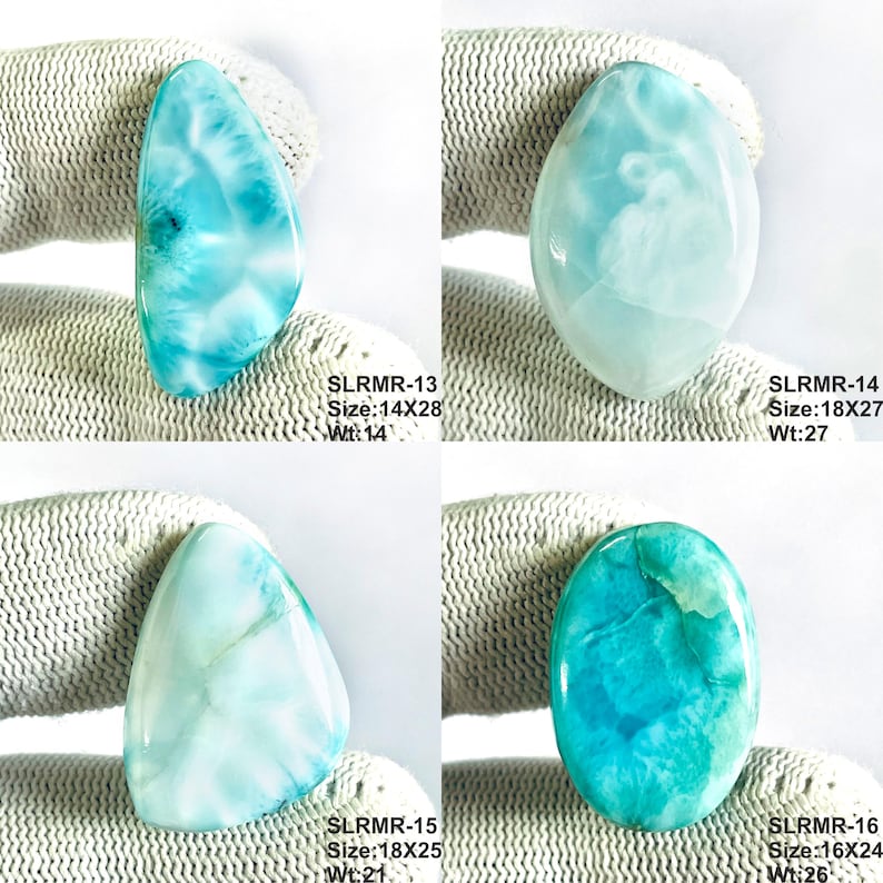 May include: Four polished Larimar cabochons with blue and white marbled patterns. Top left: SLRMR-13, 14x28. Top right: SLRMR-14, 18x27. Bottom left: SLRMR-15, 18x25. Bottom right: SLRMR-16, 16x24. Each stone displays unique oceanic color variations.