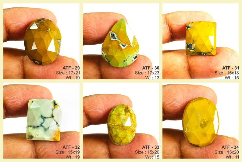 May include: Six faceted gemstones in shades of yellow, green, and white are displayed. Each stone has a unique shape, including oval, teardrop, and rectangular cuts. The sizes range from 15x18 to 17x23, and the weights vary from 11 to 19. The text "ATF" and numbers are visible.