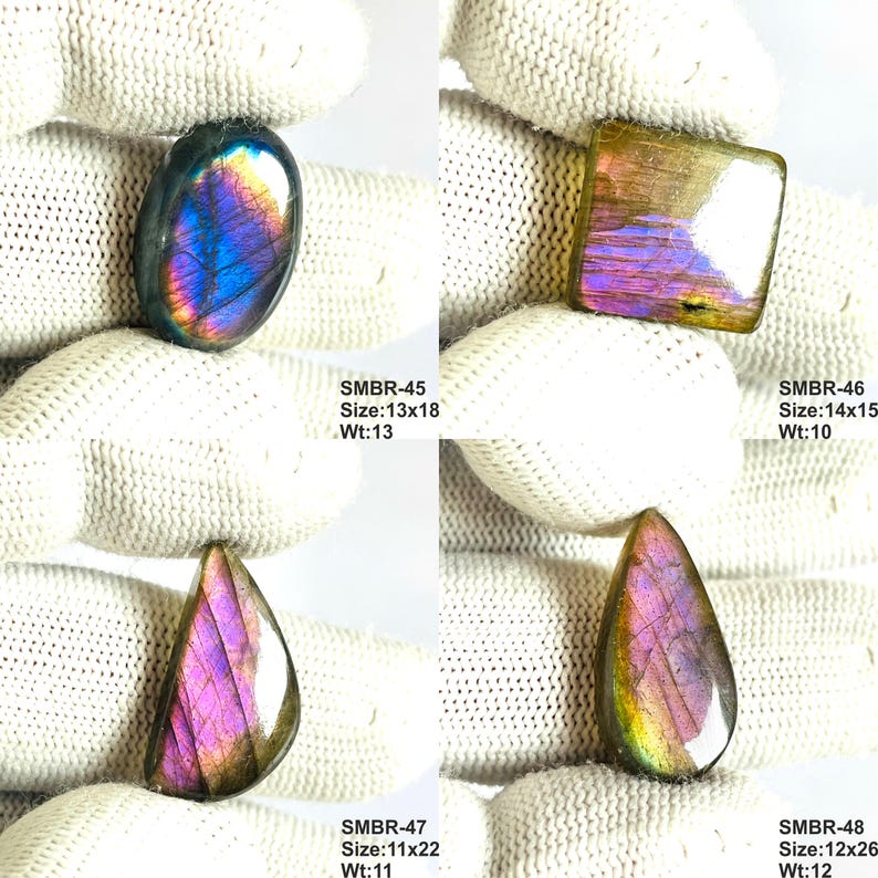 May include: Four polished labradorite gemstones in various shapes: oval, square, and teardrop. The stones display iridescent flashes of blue, purple, and gold. Each stone has a unique size and weight, as indicated by the text labels. The gemstones are displayed against a white background.