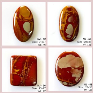May include: Four polished gemstone cabochons in oval and rectangular shapes. The stones feature a mix of red, brown, yellow, and white colors. Sizes range from 21x37 mm to 27x33 mm. Weights are between 33 and 46.