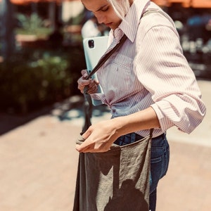 Urban French natural linen hobo crossbody bag featuring top handles, an internal zip pocket and an adjustable shoulder strap image 9