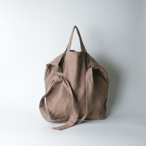 Urban French natural linen hobo crossbody bag featuring top handles, an internal zip pocket and an adjustable shoulder strap image 6