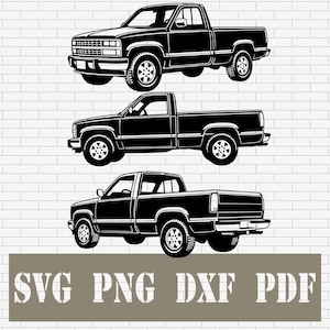 May include: A white ceramic mug with a black handle and the text "But First, Coffee" in a black, bold font. The mug is on a white surface.