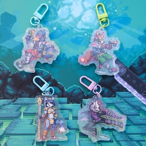 May include: Four acrylic keyrings featuring video game characters. Each keyring shows a different character with a weapon. The keyrings have light blue, green, and pink clasps. The background is a pixelated landscape.