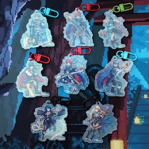 May include: A collection of eight acrylic keychains featuring various anime-style characters in dynamic poses, each equipped with a colorful plastic lobster clasp. The characters are depicted in detailed, vibrant illustrations with swords, capes, and armor, showcasing a variety of blue, red, green, and black hardware accents.