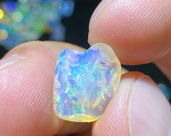 Amazing water opal with its pretty flashes of blues   AA quality weight 5.10 carats measure 15x13x7mm