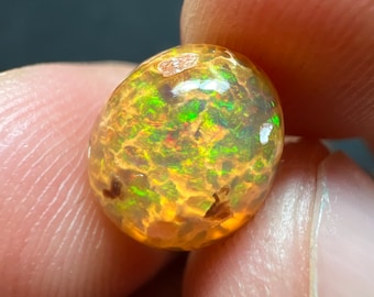 Amazing fire opal on matrix with its beautiful sparkles and landscapes AAA quality weight 3.45 carats measure 17x13x9 mm