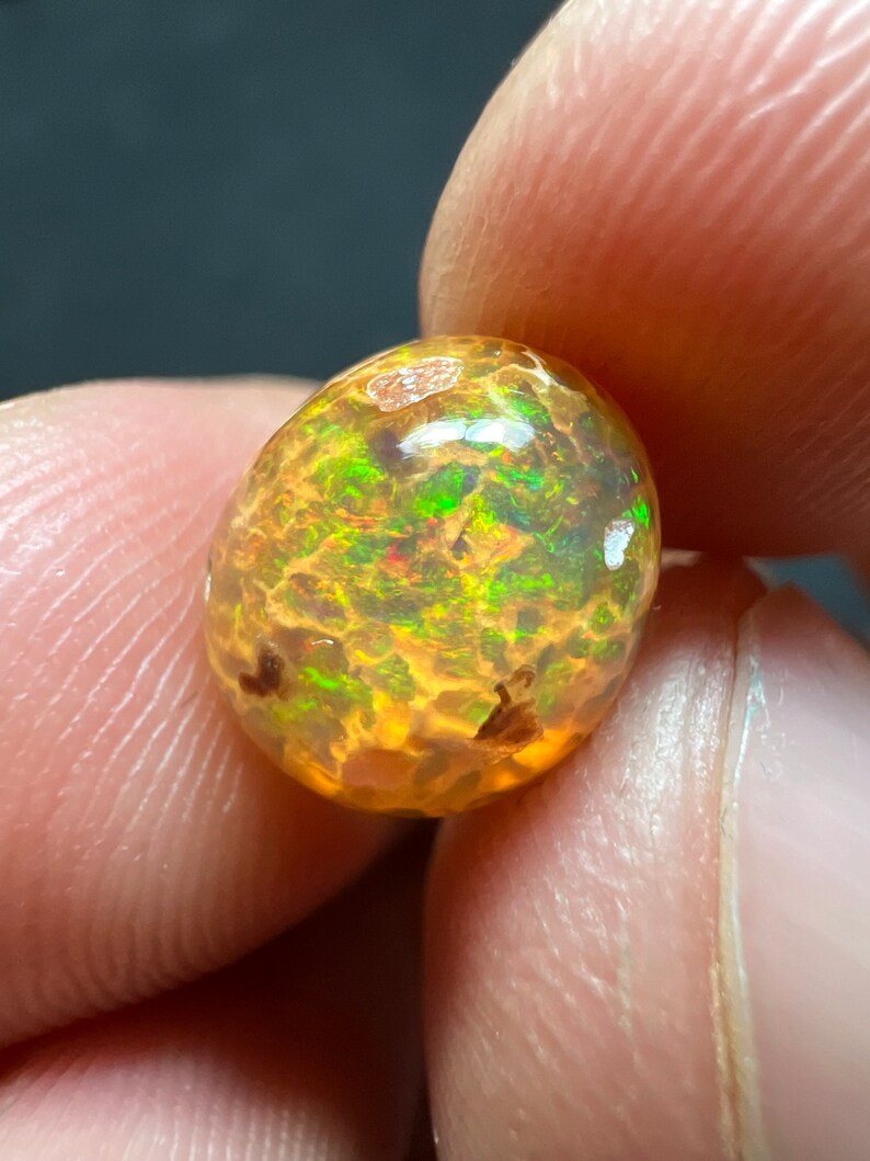 Amazing fire opal on matrix with its beautiful sparkles and landscapes AAA quality weight 3.45 carats measure 17x13x9 mm image 1