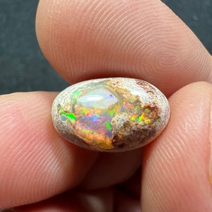 Amazing fire opal on matrix with its beautiful sparkles AAA quality weight 7.40 carats measure 16x10x7 mm image 4