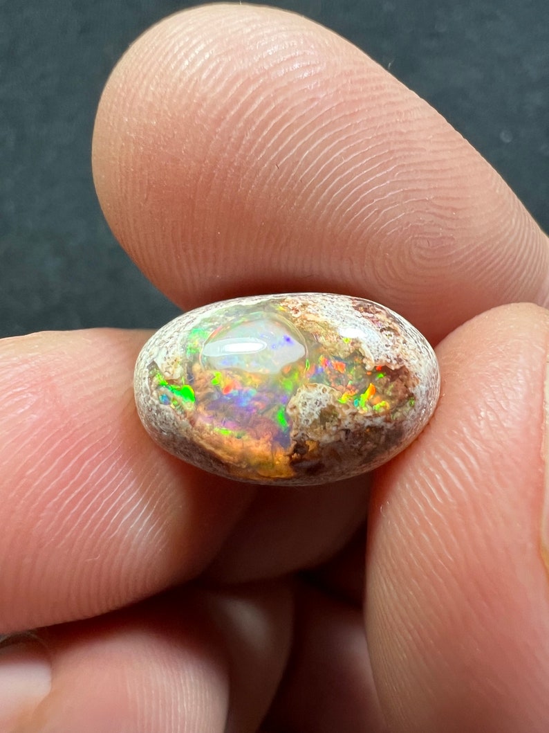 Amazing fire opal on matrix with its beautiful sparkles AAA quality weight 7.40 carats measure 16x10x7 mm image 4