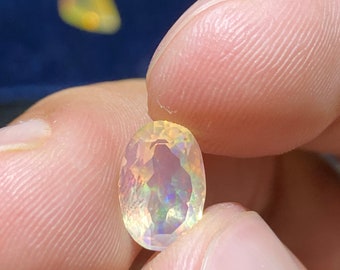 amazing faceted water opal with its pretty rainbow sparkles weight 1.70 carats measure 10.5x7x5mm