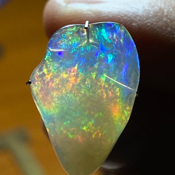 amazing fire opal with its dazzling rainbow contraluz sparkles   weight 7.00 carats measure 20x14x6mm contraluz