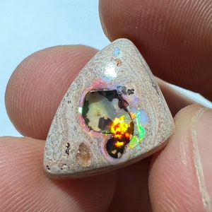 Amazing fire opal on matrix with its beautiful sparkles and landscapes AAA quality weight 10.75 carats measure 21x15x6 mm image 1