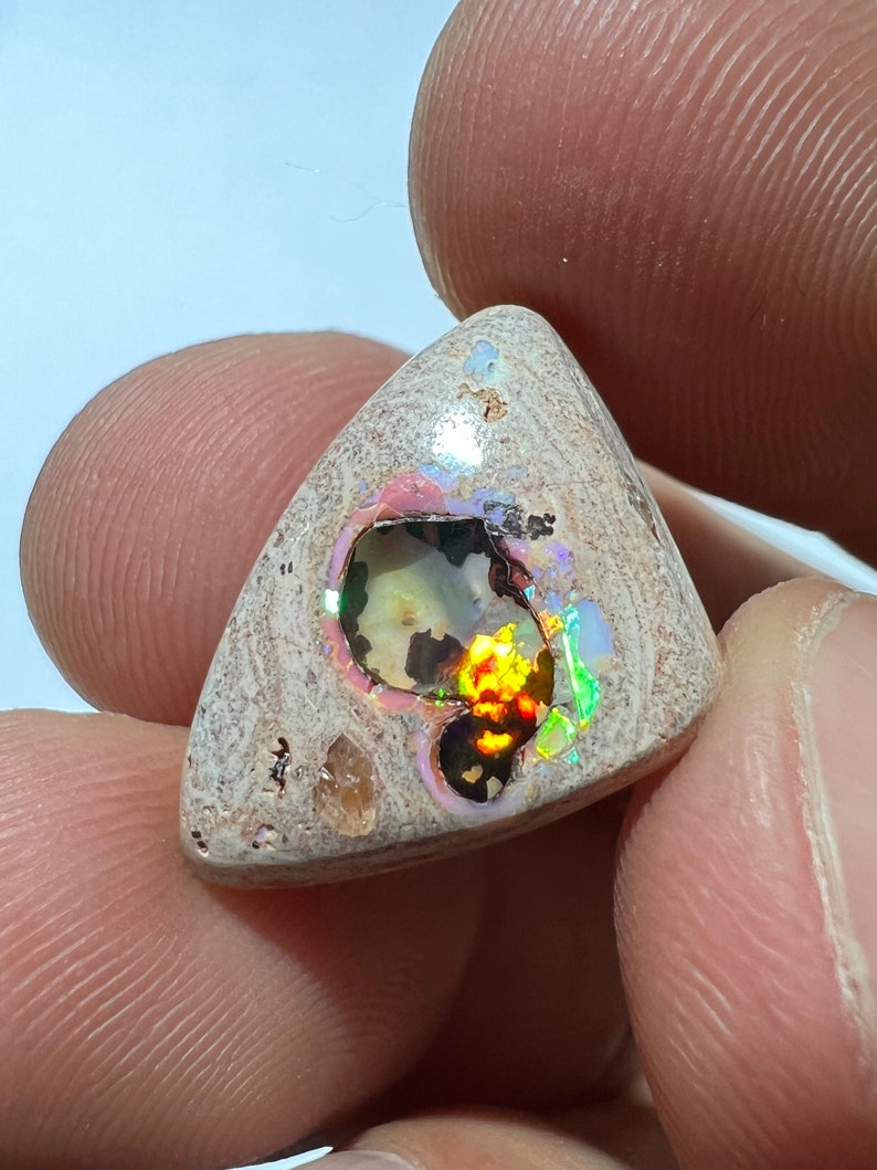 Amazing fire opal on matrix with its beautiful sparkles and landscapes AAA quality weight 10.75 carats measure 21x15x6 mm image 1