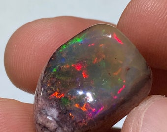 amazing fire opal on matrix with its beautiful sparkles  AAA quality weight 29.60 carats measure 23x16x12mm