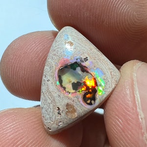 Amazing fire opal on matrix with its beautiful sparkles and landscapes AAA quality weight 10.75 carats measure 21x15x6 mm image 2