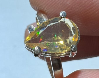 amazing 925 silver ring with its faceted fire opal with its beautiful sparkles AAA quality weight 11.40 carats measure 7