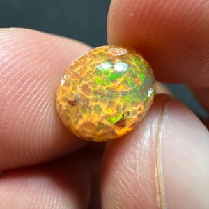 Amazing fire opal on matrix with its beautiful sparkles and landscapes AAA quality weight 3.45 carats measure 17x13x9 mm image 10