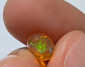 Incredible fire opal with its beautiful rainbow sparkles   weight 1.60 carats measure 9x7x5mm