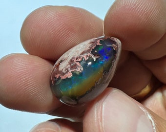 Amazing fire opal on matrix with its beautiful sparkles and landscapes AAA quality weight 17.05 carats measure 22x14.5x9 mm