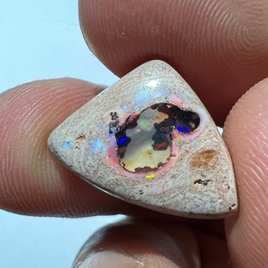 Amazing fire opal on matrix with its beautiful sparkles and landscapes AAA quality weight 10.75 carats measure 21x15x6 mm image 3