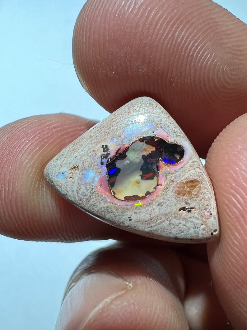 Amazing fire opal on matrix with its beautiful sparkles and landscapes AAA quality weight 10.75 carats measure 21x15x6 mm image 3