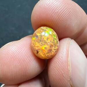 Amazing fire opal on matrix with its beautiful sparkles and landscapes AAA quality weight 3.45 carats measure 17x13x9 mm image 4