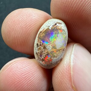 Amazing fire opal on matrix with its beautiful sparkles AAA quality weight 7.40 carats measure 16x10x7 mm image 2