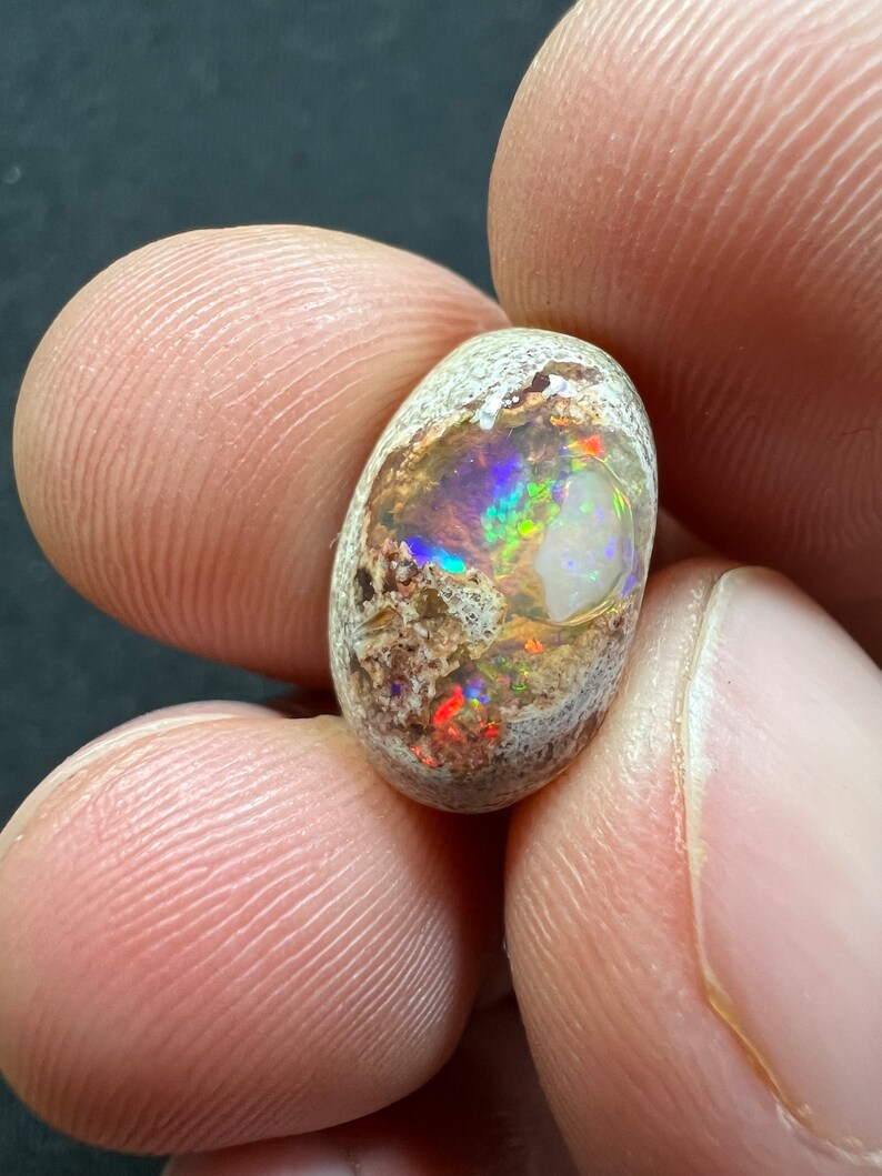 Amazing fire opal on matrix with its beautiful sparkles AAA quality weight 7.40 carats measure 16x10x7 mm image 2