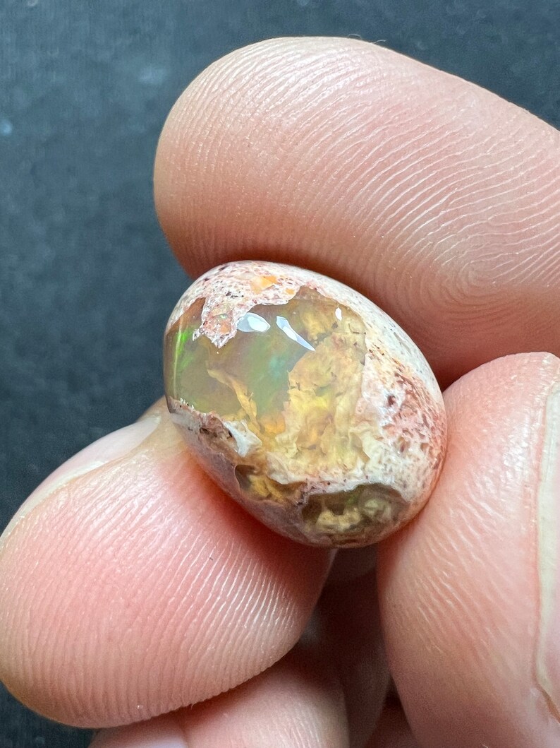 Amazing fire opal on matrix with its beautiful sparkles and landscapes AAA quality weight 10.10 carats measure 16.5x12x8mm Contraluz image 7