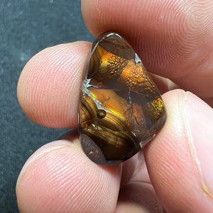 Amazing fire agate with its beautiful sparkles AAA quality weight 11.65 carats measure 21x15x4.5mm