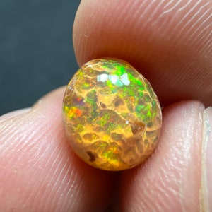 Amazing fire opal on matrix with its beautiful sparkles and landscapes AAA quality weight 3.45 carats measure 17x13x9 mm image 2