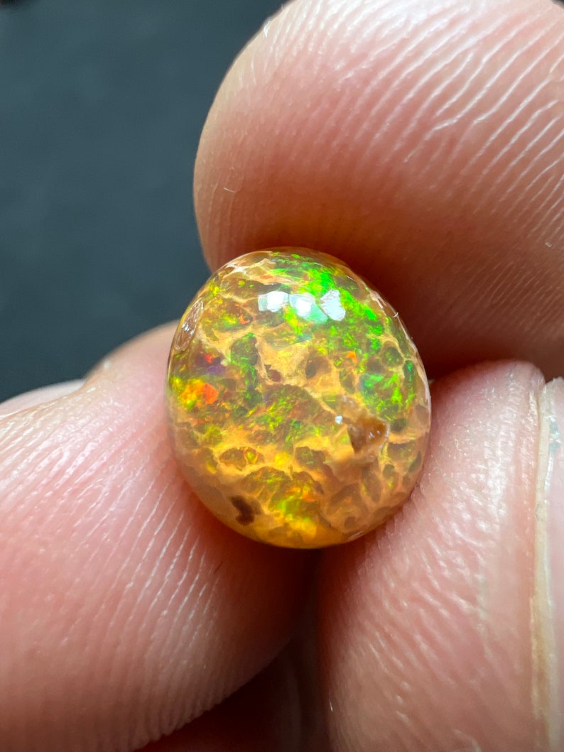 Amazing fire opal on matrix with its beautiful sparkles and landscapes AAA quality weight 3.45 carats measure 17x13x9 mm image 2