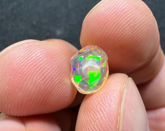 Amazing pregnant water opal with its beautiful sparkles AAA quality weight 2.10 carats measure 9.5x7.5x6mm