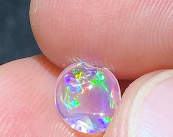 amazing water opal with its pretty rainbow sparkles AA quality weight 1.50 carats measure 8x7x5.5mm