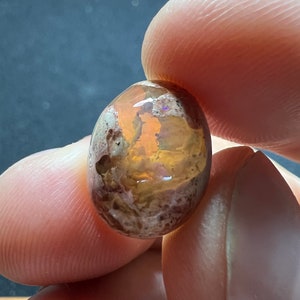 Amazing fire opal on matrix with its beautiful sparkles and landscapes AAA quality weight 10.10 carats measure 16.5x12x8mm Contraluz image 3