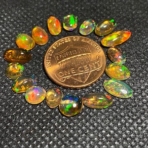 incrível quantidade de opalas de fogo com seus lindos brilhos cabochão peso 10,45 quilates 0,40 ct 0,70 ct medidas diferentes