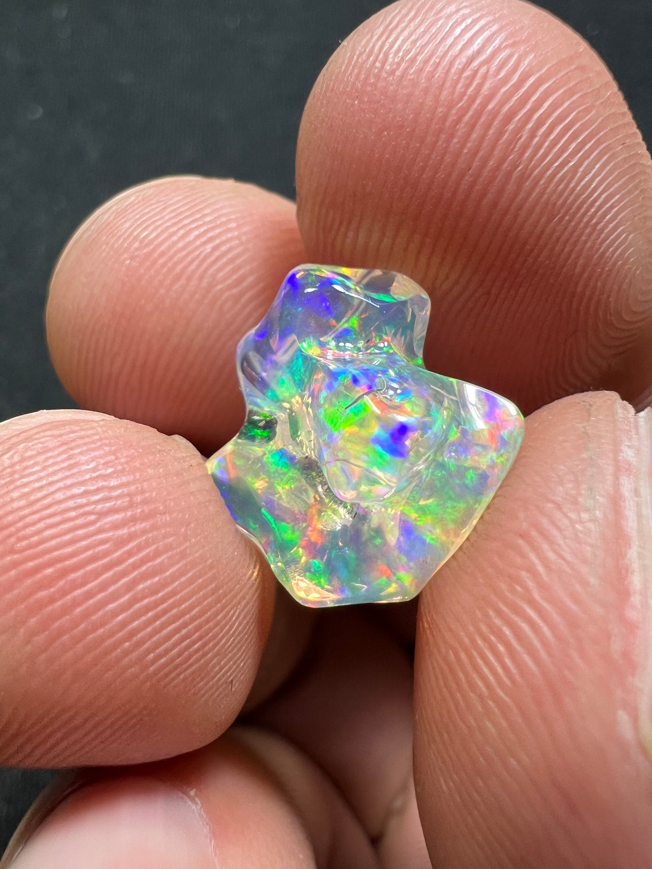 Amazing water opal with its beautiful glitters and rutile inlay quality top AAA weight 5.20 carats measure 15x14x9mm