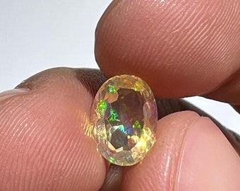 amazing faceted fire opal with its beautiful sparkles AA quality weight 1.75 carats measure 10x7.5x5mm