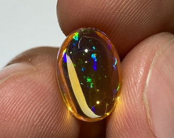 amazing fire opal with its beautiful sparkles  AAA quality weight 4.85 carats measure 14x10x7mm